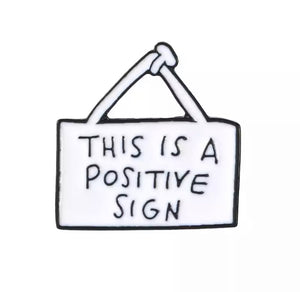 Positive Sign Pin